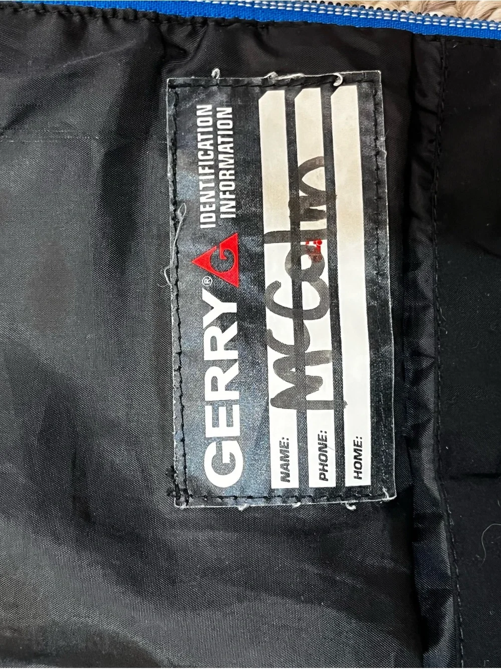 Gerry Outdoors Black Puffer Hooded Jacket with Blue Zippers and Inner Cuffs